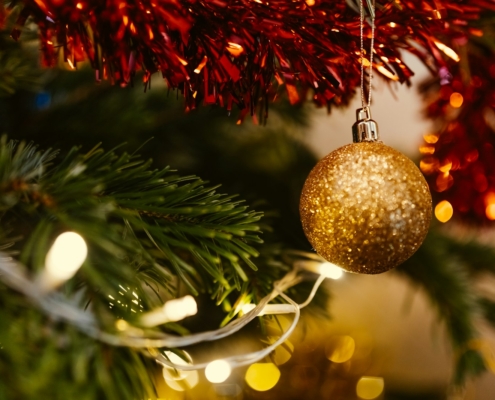 closeup photo of gold glittered Christmas bauble